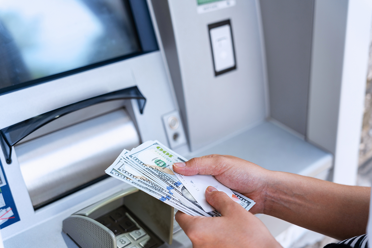 Atm machine money cash. Holding american bill cash. Woman withdraw money usd hundred dollar. Atm machine money cash. Holding american bill cash. Woman withdraw money usd hundred dollar.
