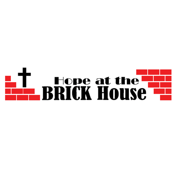 Hope at the Brick House with red bricks and a cross on top