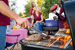 tailgating party with people and grill tailgating party with people and grill