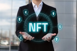 Man in suit with two hands holding up NFT with various symbols around it Man in suit with two hands holding up NFT with various symbols around it