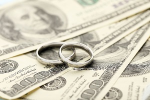 Men's and women's wedding ring on $100 dollars