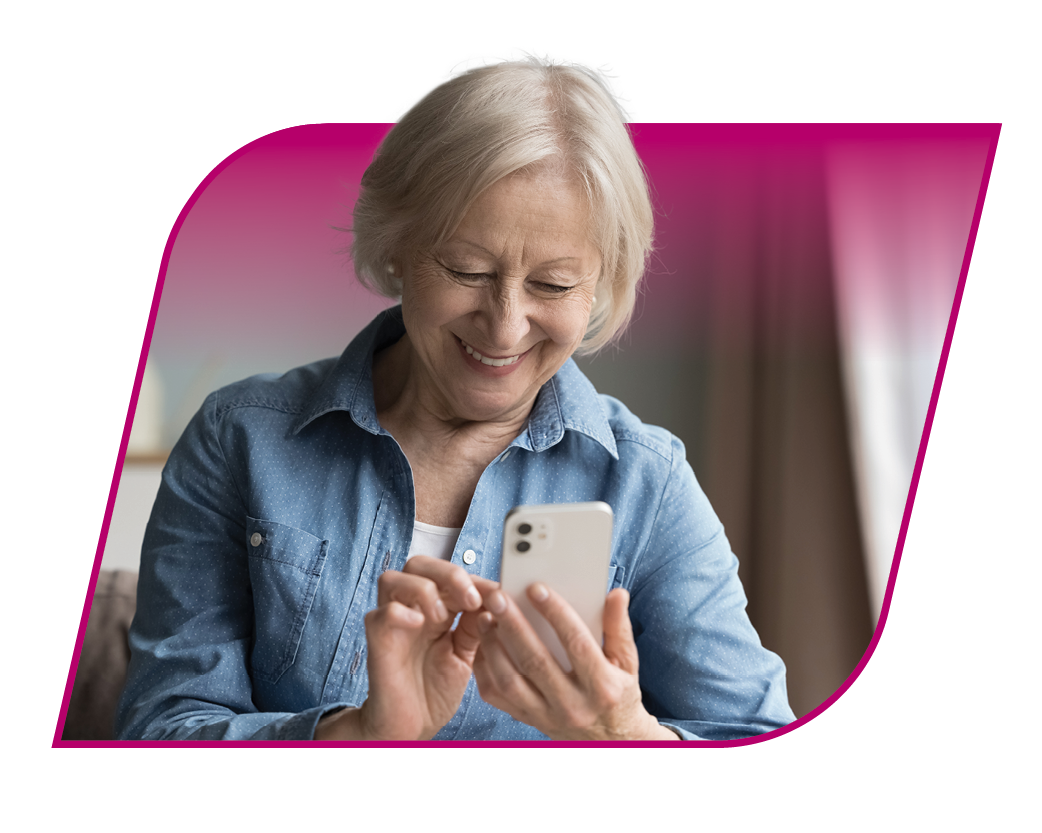 Older woman typing something on her phone