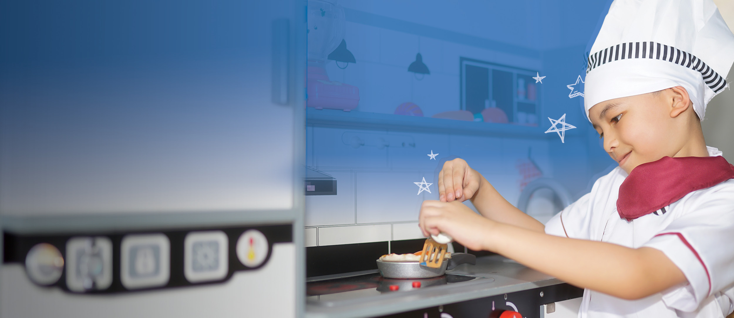 Young boy in a chef hat cooking up something good