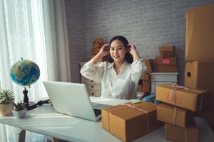 Business woman pushing her hair back