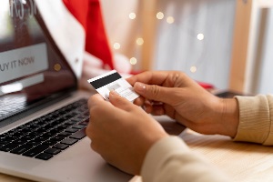 online shopping and looking at credit card
