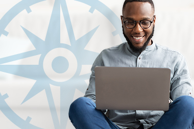 compass-page-graphics-money-smarts Younger guy on laptop