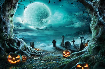 Spooky full moon in cemetery