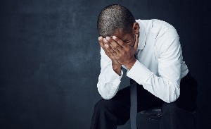 disappointed man wondering what to do next after job loss