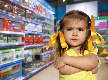 Young girl with her arms crossed