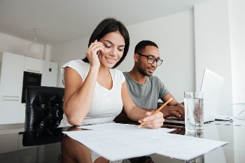 Husband and wife looking at finances