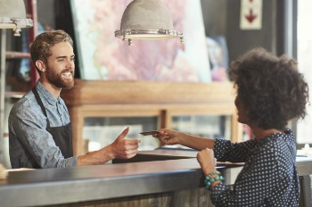 young-woman-paying-with-credit