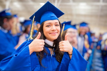 Graduate with thumbs up