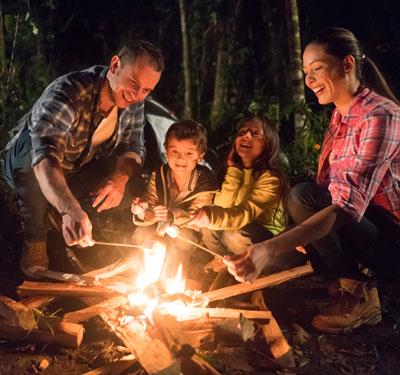 Family by the campfire Family by the campfire