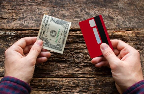 Man Holding Card and Money Man Holding Card and Money
