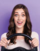 Woman with steering wheel
