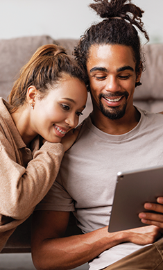 Couple looking at tablet