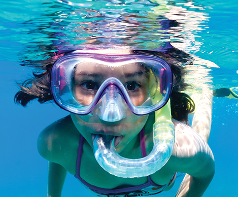 Girl with snorkel gear
